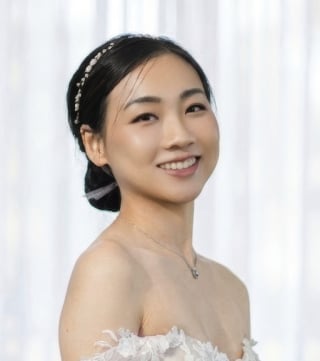 47-Fresh-pink-tones-on-cheeks-and-lips-designed-for-radiant-Asian-bridal-beauty